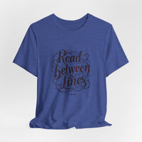 Load image into Gallery viewer, Read Between the Lines T-Shirt — Literary Quote Graphic Tee for Book Lovers