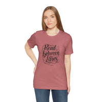 Load image into Gallery viewer, Read Between the Lines T-Shirt — Literary Quote Graphic Tee for Book Lovers
