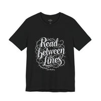 Load image into Gallery viewer, Read Between the Lines T-Shirt — Gothic Script Graphic Tee