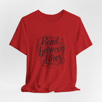 Load image into Gallery viewer, Read Between the Lines T-Shirt — Literary Quote Graphic Tee for Book Lovers