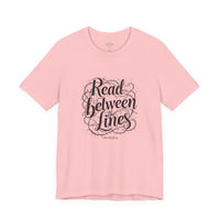 Load image into Gallery viewer, Read Between the Lines T-Shirt — Literary Quote Graphic Tee for Book Lovers
